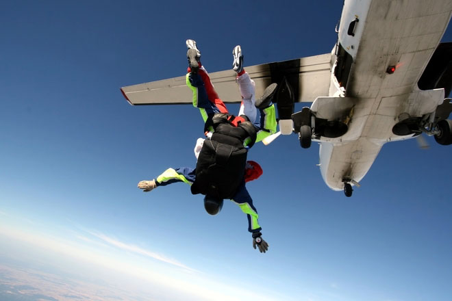 Skydiver jumping out of a plane